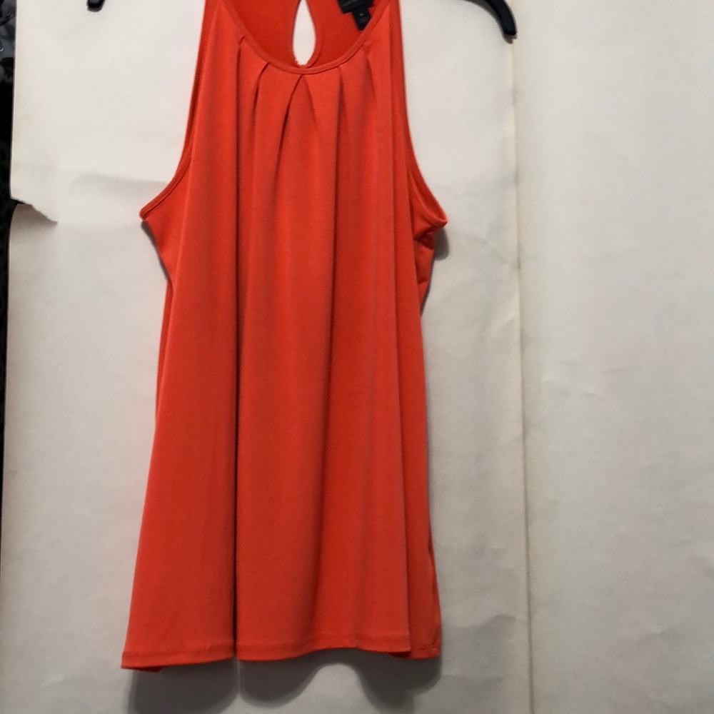 Bright orange top